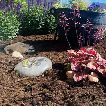 Mulching - Photo of a beautiful mulched garden by Lavish Landscaping Service.